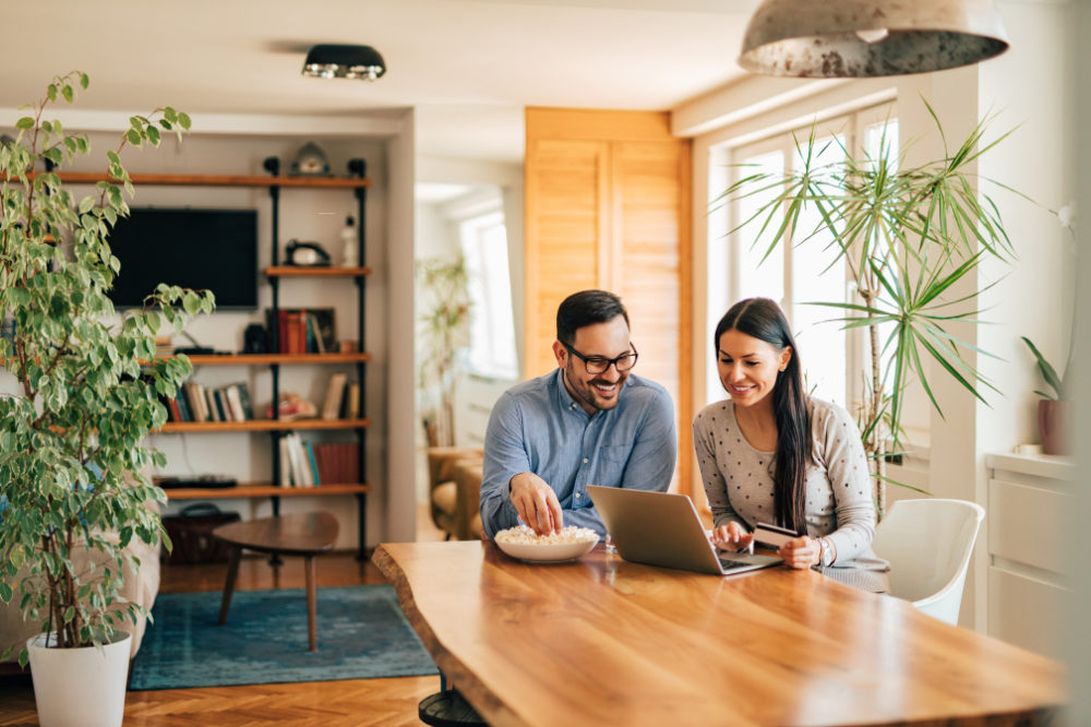 Couple Looking At Insurance Management