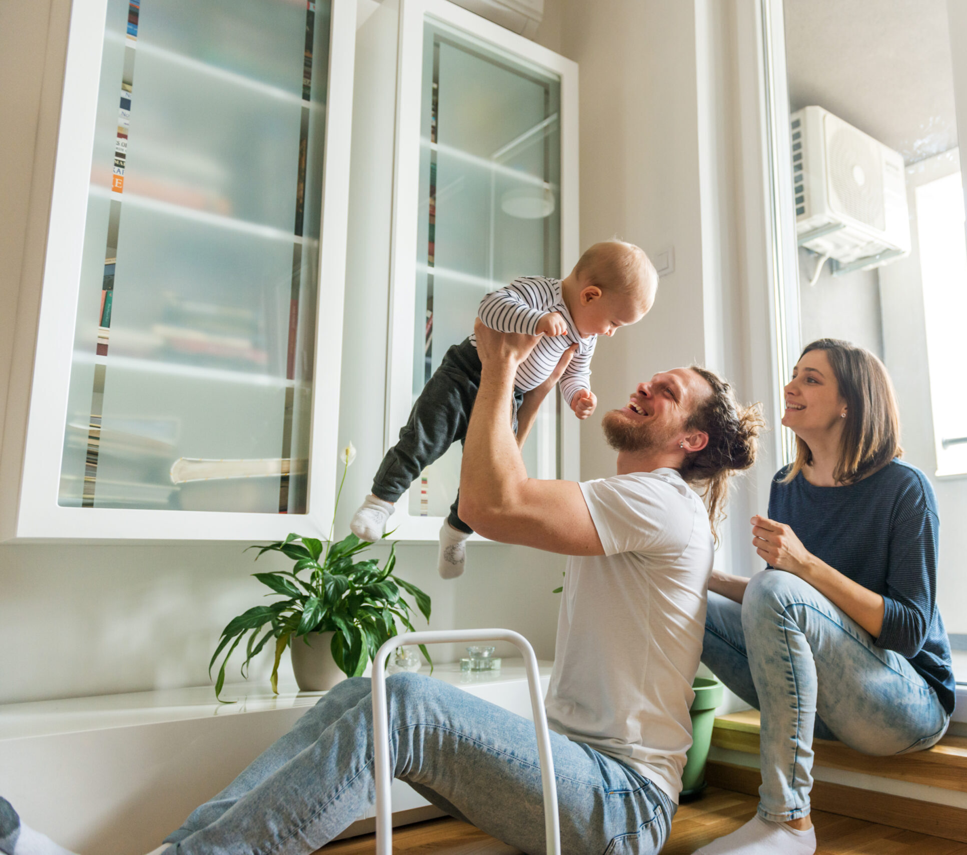 Young family planning for future financial growth at home